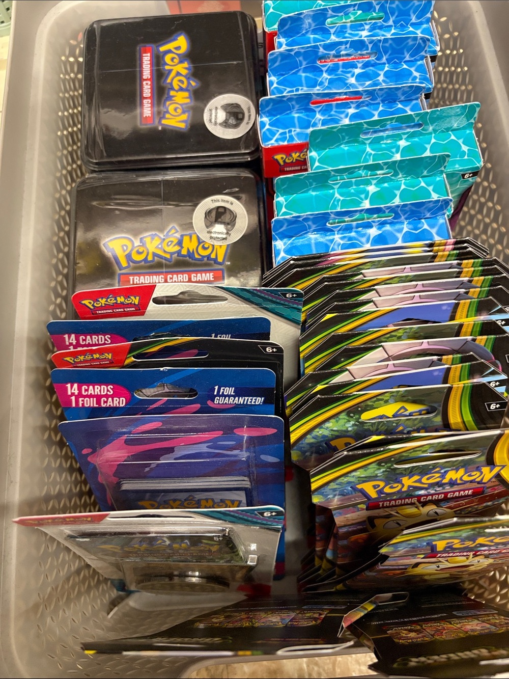 Pokemon Booster Packs & Metal Tins - Black, Blue, Teal